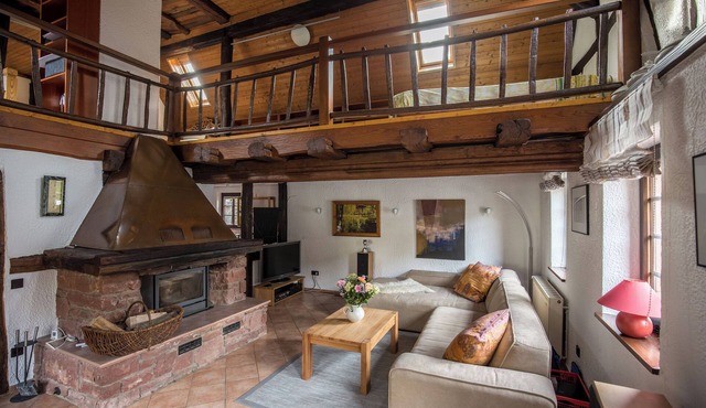 Romantic holiday home with sauna and gallery with fireplace