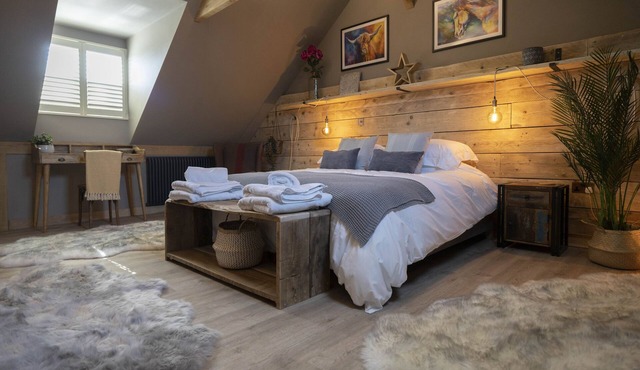 Romantic luxury barn in quaint countryside village