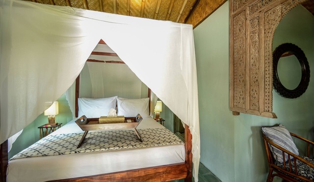 Romantic Private Villa facing the pool.Soft aqua handmade tiles and antiques.
