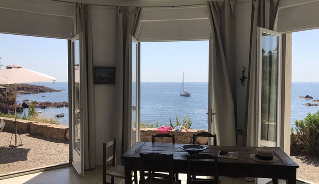 Romantic Provencal house 1947, waterfront on small beach.