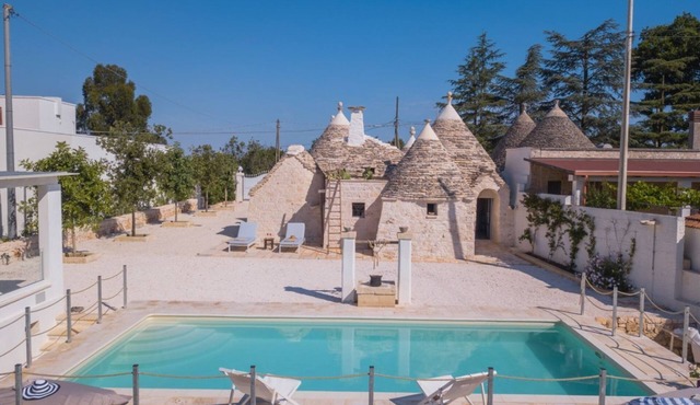 Romantic trulli with relaxation area, whirlpool, sauna, and private pool