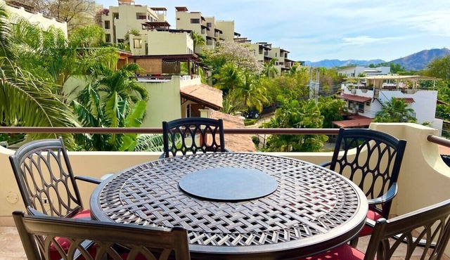 Rooftop Sunset Cove, This spacious and sunlit apartment features 2 bedrooms, 1.5 bathrooms, a stunning rooftop terrace