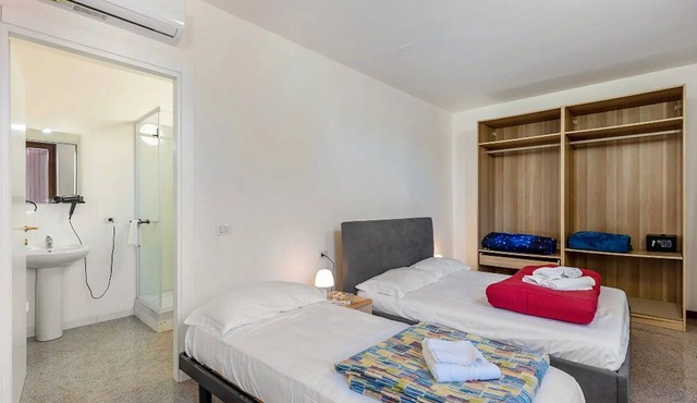 Room 'Camera Tripla Con Balcone' with Shared Terrace, Wi-Fi and Air Conditioning