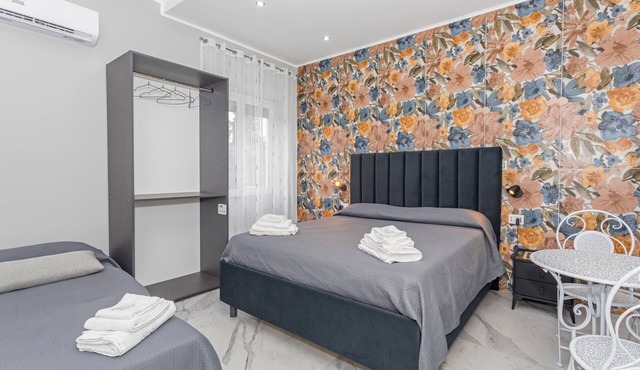 Room 'Dolce Relax - Tripla Luxury' with Wi-Fi and Air Conditioning