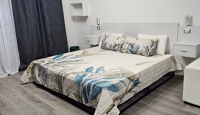 Room 'Quadrupla' with Shared Terrace, Wi-Fi and Air Conditioning