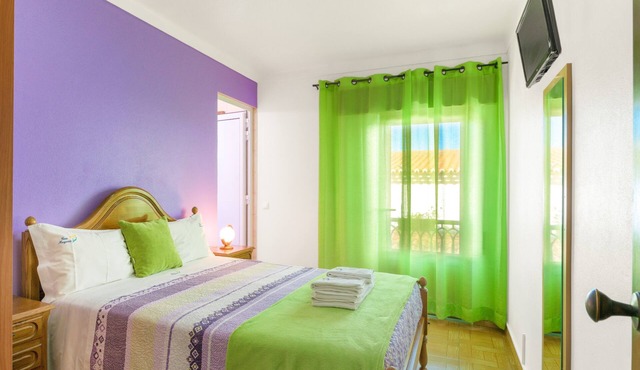 Room 'Quarto Lilás' with Balcony and Wi-Fi