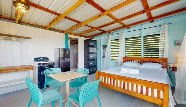 Rustic beachfront cabin with private deck, ocean views & family-friendly vibe