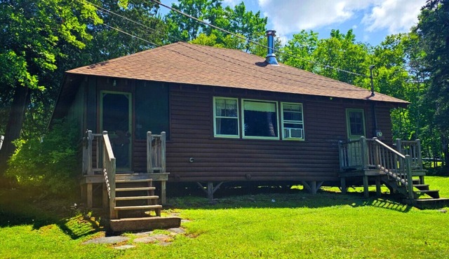Rustic Camp- Direct ATV Access*Pet Friendly*Lake Access*Community Dock