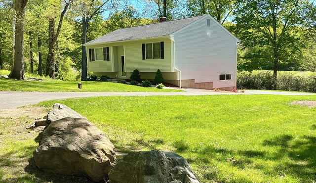 Rustic Charm Meets Modern Comfort 3-Bedroom Raised-Ranch Cottage in Wooded Area