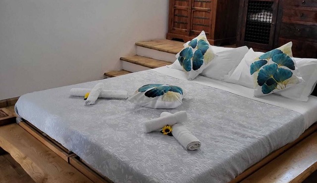 Rustic Elegance at Two Steps from Rome: Relaxation among Exposed Beams and Cotto