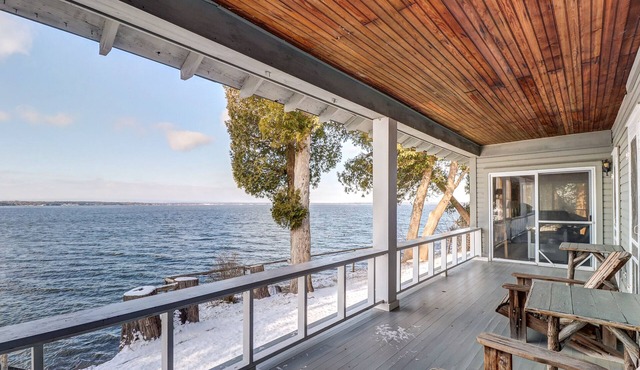 Rustic lakefront home with big porch, WiFi & easy water access
