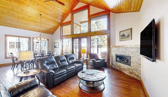 Rustic lakefront getaway with mountain views - dock, hot tub, fireplace & W/D