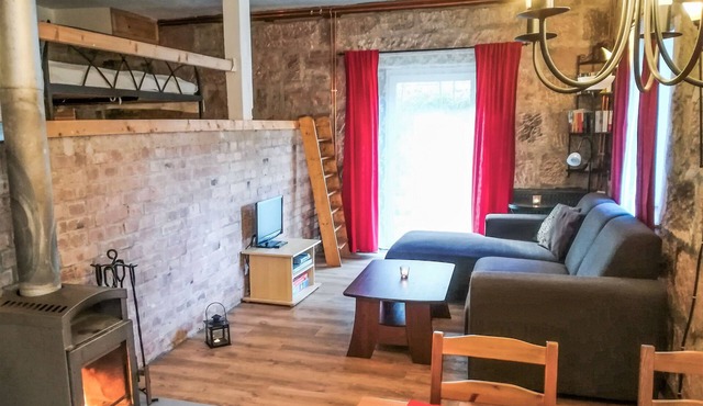 Rustic rustic with natural stone walls and wood-burning stove in the Black Forest National Park