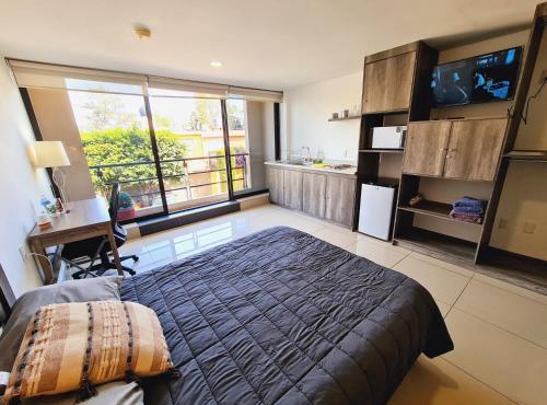 S08 MASTER SUITE Premium TEC CEM con Cocineta WiFi Balcón Parking Terraza