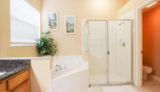 Sabal Harbour pool home with lake views - Harbour Happiness