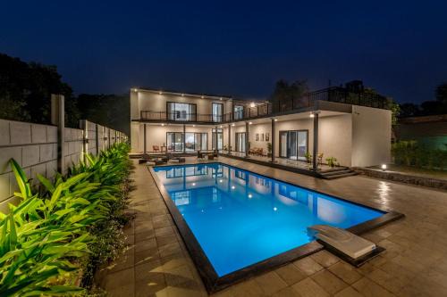 SaffronStays Mayfair Gardens - 4BR pet-friendly pool villa with patio, den, board games & modern interiors near jetty