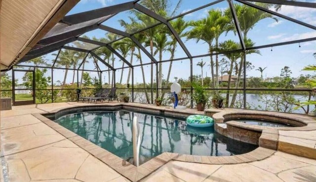 Sanctuary w/covered heated saltwater pool on canal