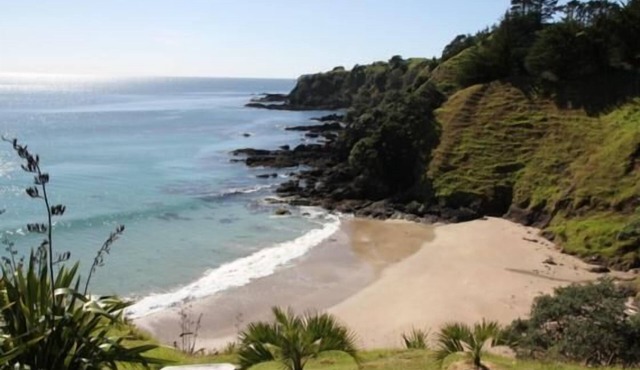 Sandy beach Mahinepua