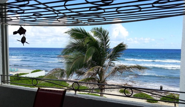 Sea-facing 2Br unit on well kept grounds with swimming pool and tennis court .