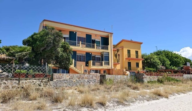 Seafront Escape Villa Nina: Garden, Balconies & Steps from the Sand