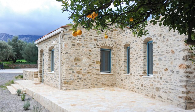 Seafront Stone House · Steps from the Beach