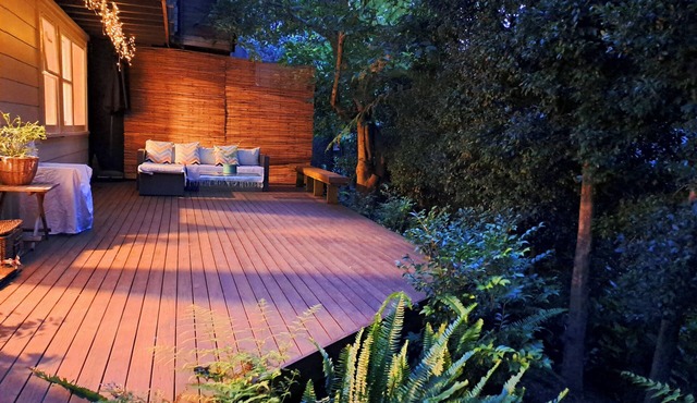 Seaside City Retreat - secluded, sunny, walk to beaches & village.