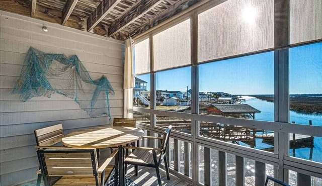 Seawatch Condo | Marsh View & Pool | Cozy 2BR | Relaxing Amenities Free Travel Insurance on weekly rentals