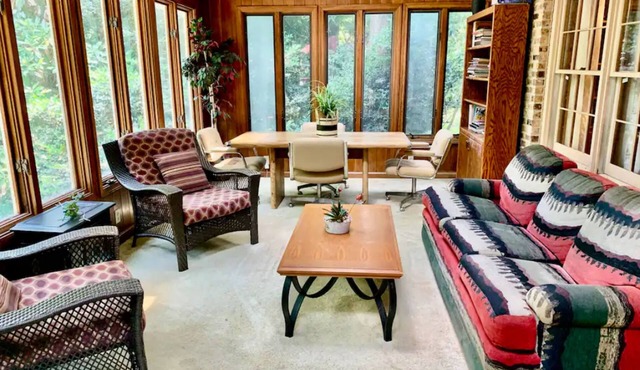 Secluded acreage with in-ground pool, sunroom, & wood fireplace - dog-friendly