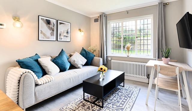 Secluded one bedroom flat with garden near to busy village and the seafront