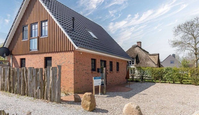 Seequartier - Nordsee Ferienhaus Tating by Interhome