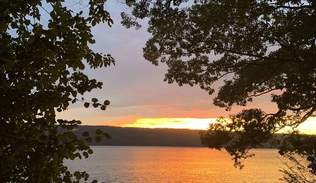 Seneca Lake front cottage on heart of Wine Trail, with gorgeous sunset views.