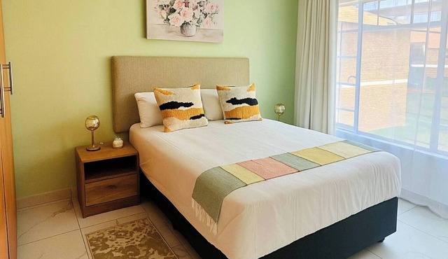 Serene 3-Bedroom Apartment in Rustenburg Security Complex
