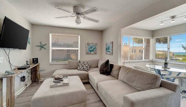 Serene oceanfront suite with Gulf view, grill, patio, central AC, & W/D