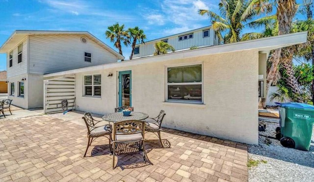 Serene oceanfront suite with Gulf view, grill, patio, central AC, & W/D