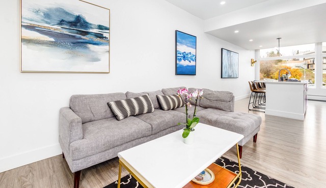 Serene waterfront townhouse with balcony, stunning views, dogs OK, fireplace