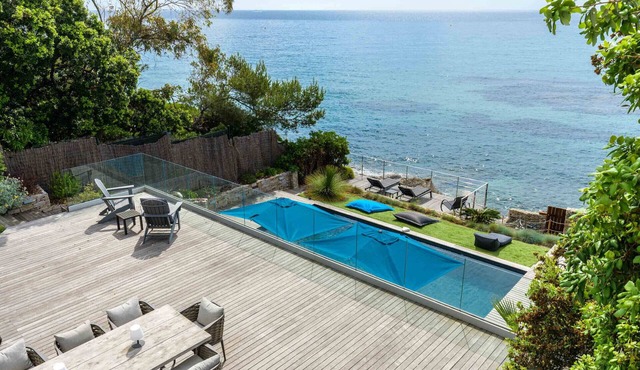 Serenity villa with private beach access, sea view and heated pool