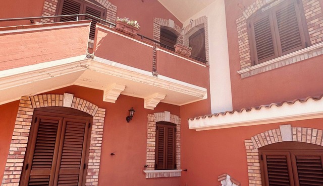 "Set in a beautiful natural setting and surrounded by lush gardens."