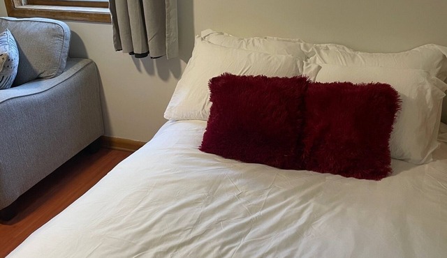 Shiraz Suite Retro Wine-Inspired Hideaway - Walkable to Stampede Grounds