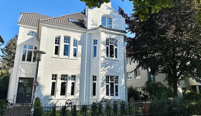 Shore residence: old building jewel on the coastal canal with terrace & garden