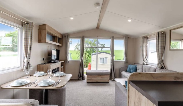 Silver Caravan with decking