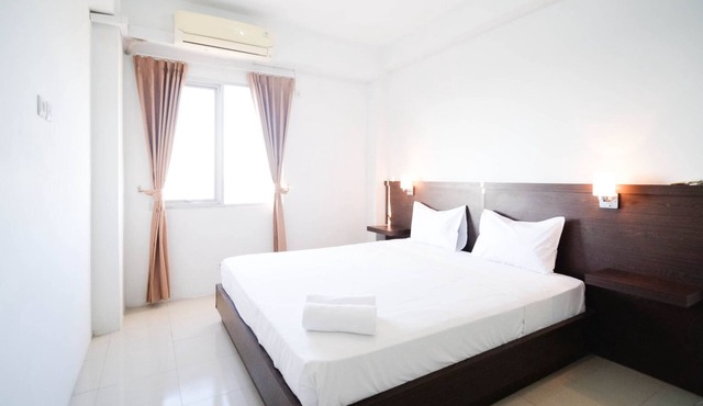 Simple 2Br With Extra Bed At Menara Rungkut Apartment