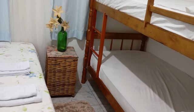 Simple and comfortable central house Rua Oriental Centro