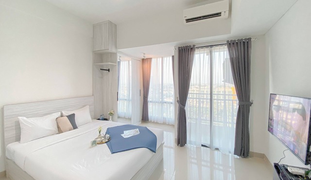 Simple White Designed Studio At Lrt City Bekasi Apartment