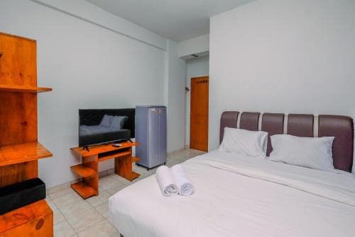 Simply Studio Room at Margonda Residence 1 Apartment By Travelio