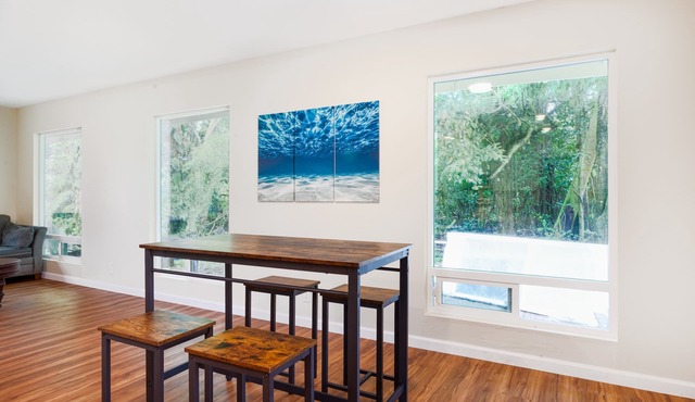 Single-level, dog-friendly home with a full kitchen, washer/dryer, patio