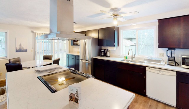 Single-level home with fenced yard, covered patio & central AC
