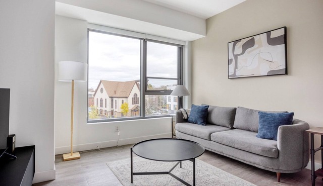 Sleek Central Square 1BR w/Gym, W/D & Roof, near T, by Blueground