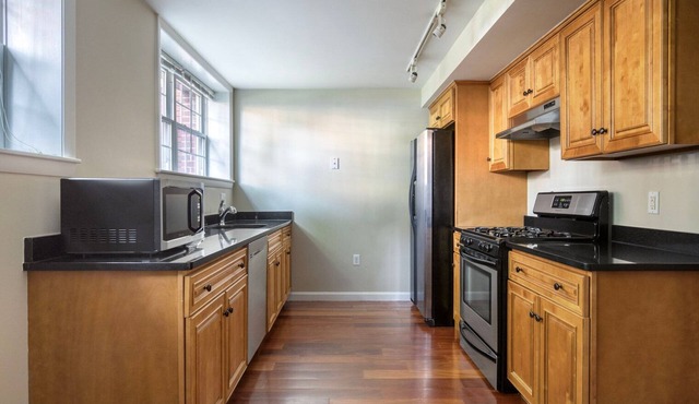 Sleek Porter Square 1BR w/ Gym & W/D, nr T Stops, by Blueground