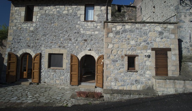 Small building from sky to earth, on three levels with two terraces