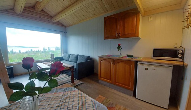 small camping cabbin with shared bathroom and kitchen near by